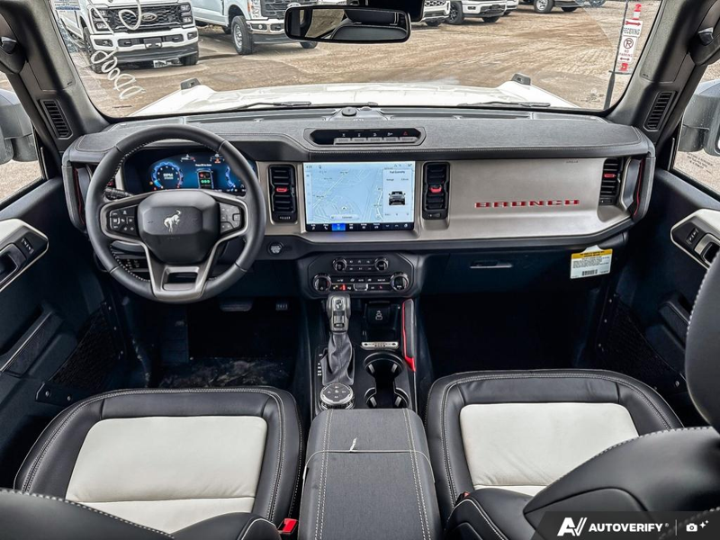 NEW 2026 Ford Bronco Outer Banks 60th Anniversary Edition - Wimbledon White Exterior / BLACK ONYX-LEATHER/VINYL Interior - $75,557 - Stock #E60681 - VIN 1FMEE8BH0TLA92542 - Photo 24
