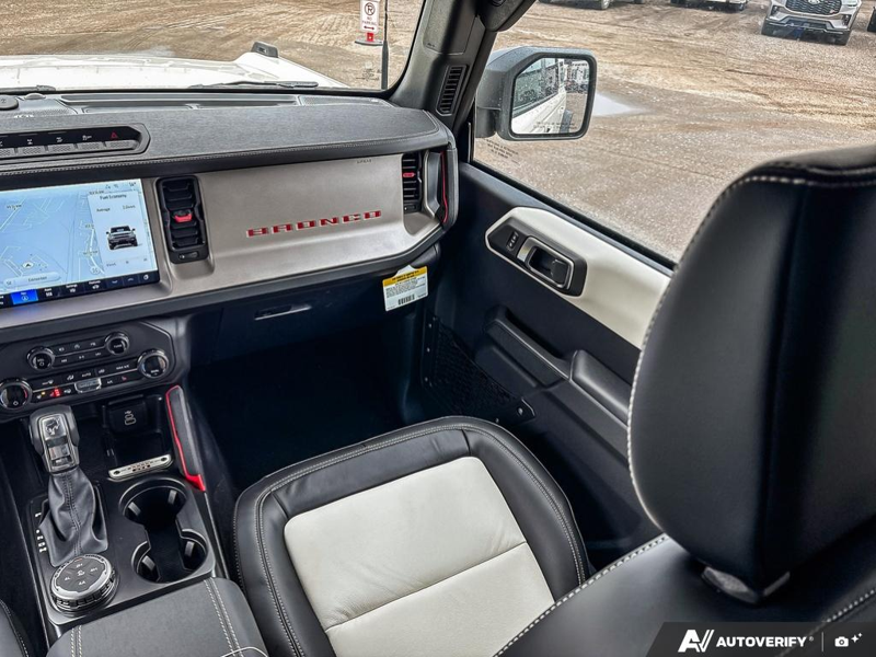 NEW 2026 Ford Bronco Outer Banks 60th Anniversary Edition - Wimbledon White Exterior / BLACK ONYX-LEATHER/VINYL Interior - $75,557 - Stock #E60681 - VIN 1FMEE8BH0TLA92542 - Photo 25