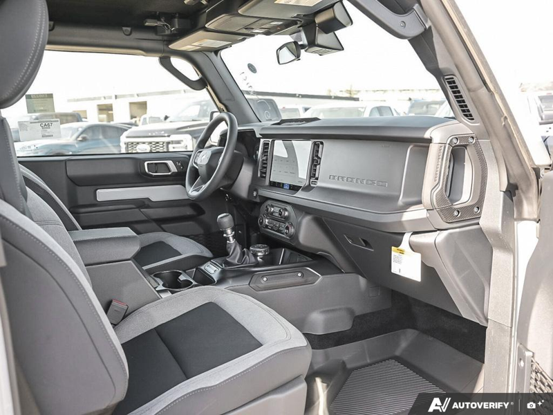 NEW 2026 Ford Bronco Base Sasquatch Manual - Avalanche Exterior / BLACK CLOTH GREY Interior - $61,356 - Stock #E60239 - VIN 1FMDE6AH1TLA43559 - Photo 25