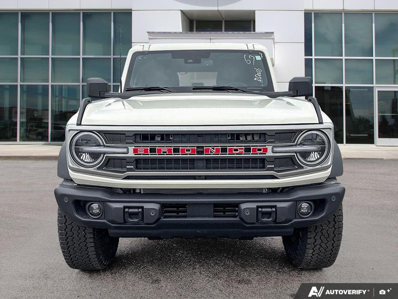 NEW 2026 Ford Bronco Outer Banks 60th Anniversary Edition - Wimbledon White Exterior / BLACK ONYX-LEATHER/VINYL Interior - $75,557 - Stock #E60681 - VIN 1FMEE8BH0TLA92542 - Photo 2