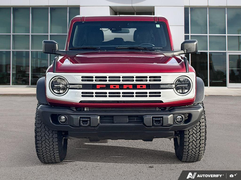 USED 2026 Ford Bronco Heritage Edition - Ruby Red Metallic Tc Exterior - $77,385 - Stock #EP4793 - VIN 1FMEE4DP8TLA68650 - Photo 2