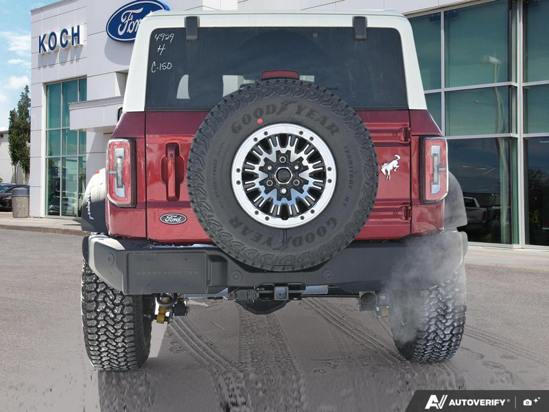 NEW 2026 Ford Bronco Outer Banks 60th Anniversary Edition - Ruby Red Tri-coat Metallic Exterior / BLACK ONYX-LEATHER/VINYL Interior - $88,774 - Stock #E60405 - VIN 1FMEE8BP0TLA54929 - Photo 4