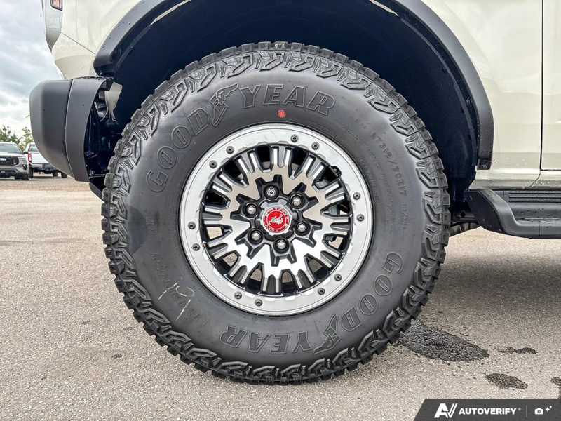 NEW 2026 Ford Bronco Outer Banks 60th Anniversary Edition - Wimbledon White Exterior / BLACK ONYX-LEATHER/VINYL Interior - $88,624 - Stock #E60716 - VIN 1FMEE8BPXTLB02498 - Photo 6