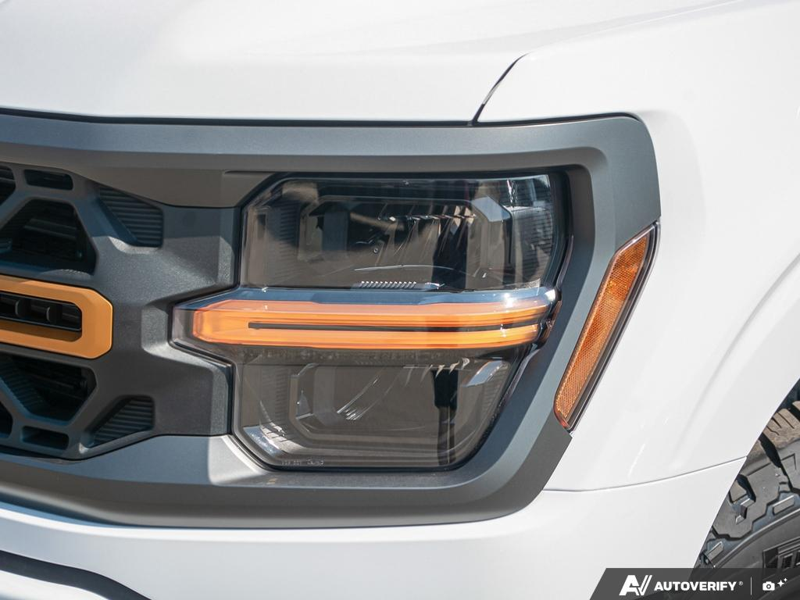 NEW 2026 Ford F-150 Tremor - Oxford White Exterior / BLACK TREMOR LEATHER Interior - $80,949 - Stock #E60955 - VIN 1FTFW4L89TFB68545 - Photo 10