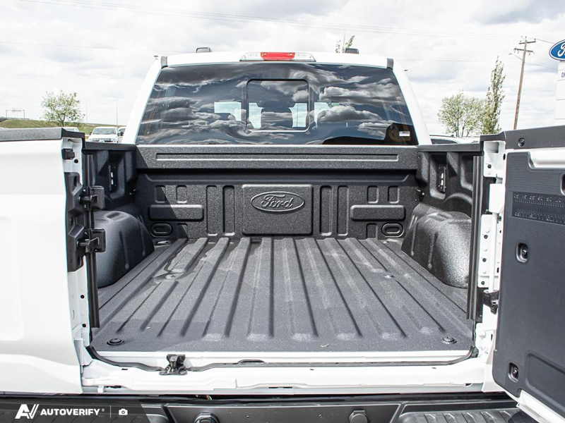 NEW 2026 Ford F-150 LARIAT - Star White Tri-coat Metallic Exterior / BLACK ACTIVE X Interior - $86,793 - Stock #D60573 - VIN 1FTFW5L84TFA96417 - Photo 11
