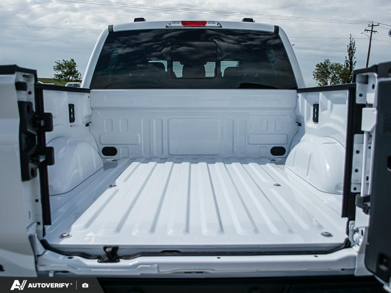 NEW 2026 Ford F-150 Tremor - Oxford White Exterior / BLACK TREMOR LEATHER Interior - $91,707 - Stock #D60553 - VIN 1FTFW4L82TFB03584 - Photo 11