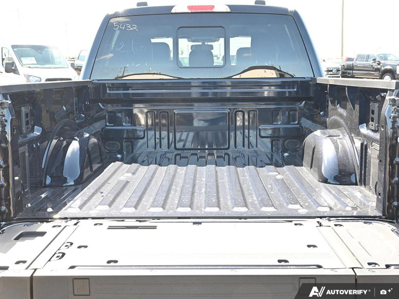 NEW 2026 Ford F-150 LARIAT - Antimatter Blue Metallic Exterior / BLACK ACTIVE X Interior - $86,482 - Stock #E60772 - VIN 1FTFW5L89TFB15432 - Photo 11