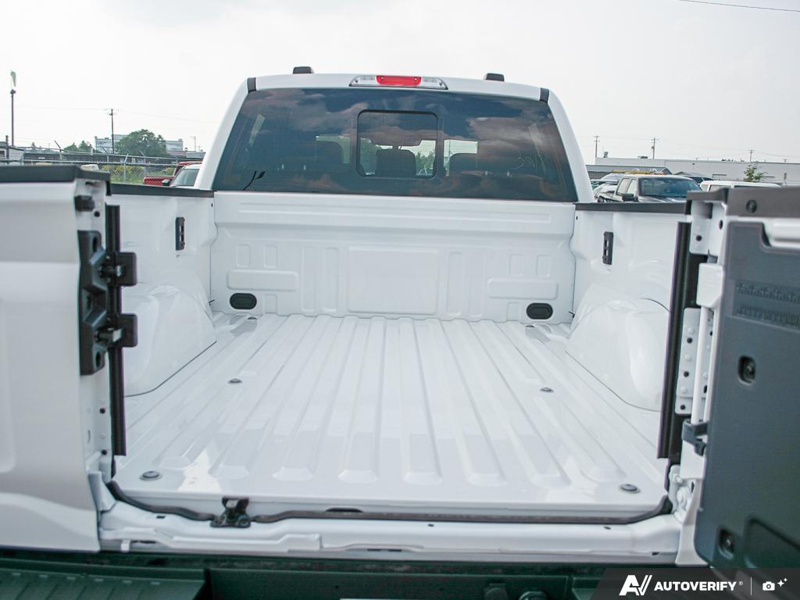NEW 2026 Ford F-150 LARIAT Long Box - Star White Tri-coat Metallic Exterior / BLACK ACTIVE X Interior - $87,463 - Stock #E60906 - VIN 1FTFW5L82TFB68456 - Photo 11