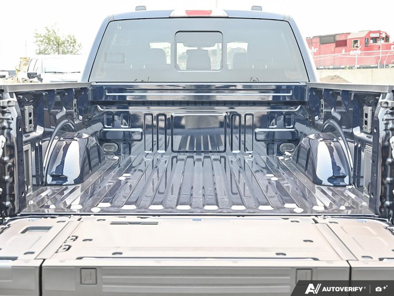 NEW 2026 Ford F-150 LARIAT - Antimatter Blue Metallic Exterior / BLACK ACTIVE X Interior - $86,262 - Stock #E60899 - VIN 1FTFW5L83TFB68837 - Photo 11