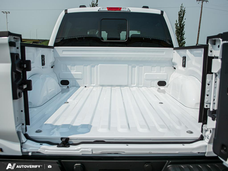 NEW 2026 Ford F-150 Tremor - Oxford White Exterior / BLACK TREMOR LEATHER Interior - $88,579 - Stock #D60657 - VIN 1FTFW4L8XTFB46554 - Photo 11