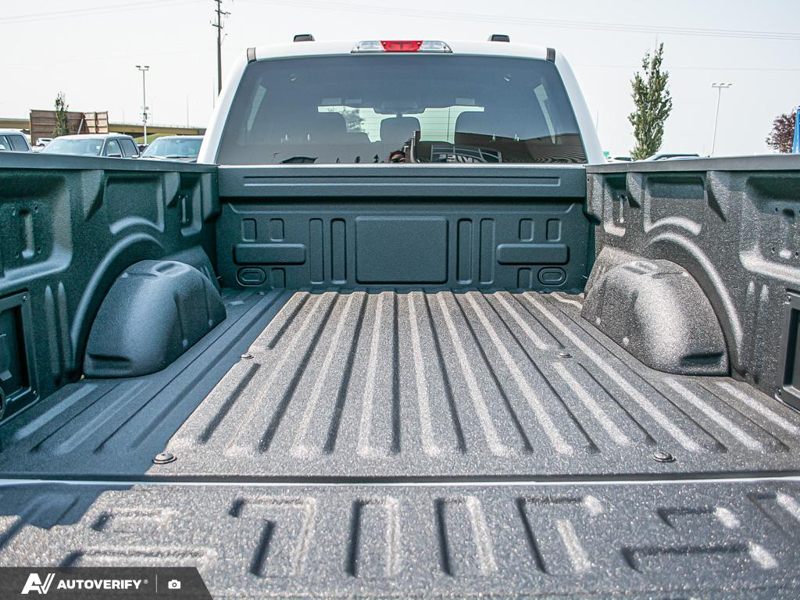 NEW 2026 Ford F-150 XLT - Oxford White Exterior / BLACK, UNIQUE SPORT CLOTH 40/CONSOLE/40 FRONT-SEATS Interior - $64,160 - Stock #D60737 - VIN 1FTFW3L89TKE42781 - Photo 11