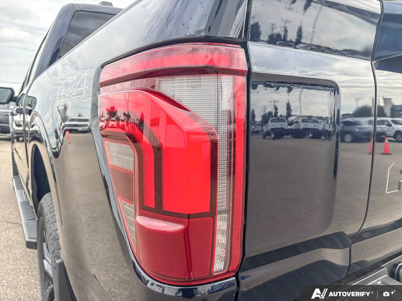 NEW 2026 Ford F-150 LARIAT - Antimatter Blue Metallic Exterior / BLACK ACTIVE X Interior - $86,262 - Stock #E60900 - VIN 1FTFW5L84TFB69768 - Photo 11