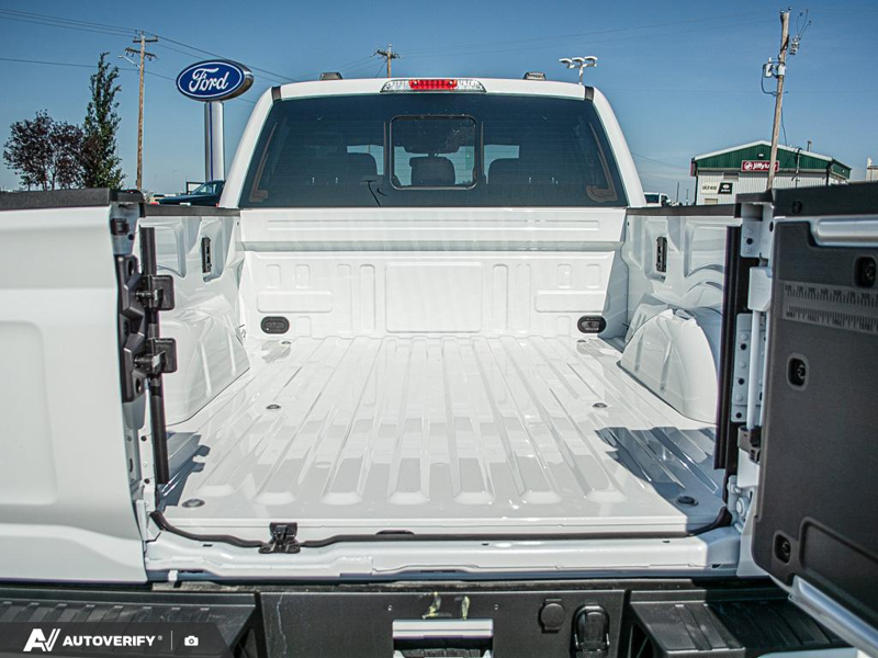 NEW 2026 Ford F-150 LARIAT - Star White Tri-Coat Exterior / BLACK ACTIVE X Interior - $89,402 - Stock #D60781 - VIN 1FTFW5L80TFB61358 - Photo 11