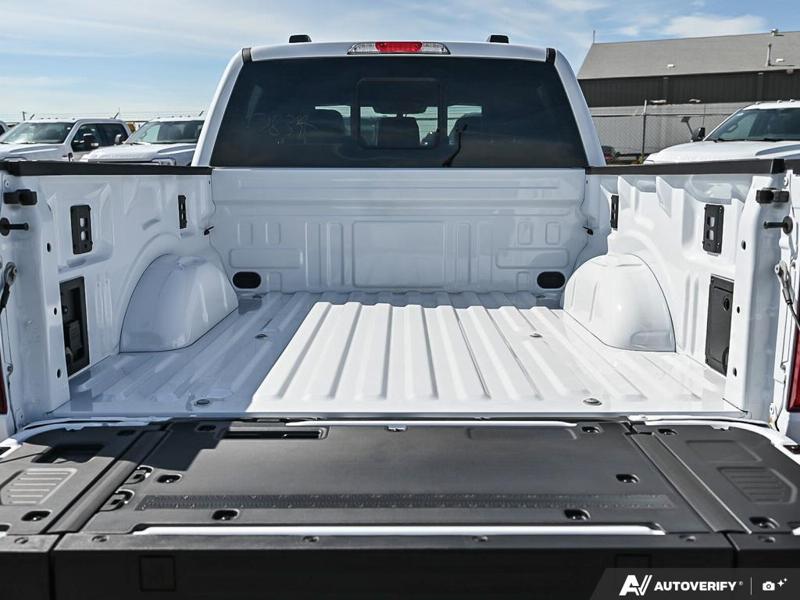 NEW 2026 Ford F-150 Tremor - Oxford White Exterior / BLACK TREMOR LEATHER Interior - $85,944 - Stock #E60980 - VIN 1FTFW4L84TFB68078 - Photo 11
