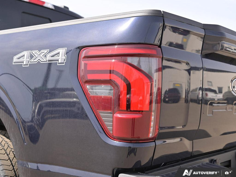 NEW 2026 Ford F-150 LARIAT - Antimatter Blue Metallic Exterior / BLACK ACTIVE X Interior - $92,839 - Stock #E60660 - VIN 1FTFW5L50TFA39914 - Photo 12