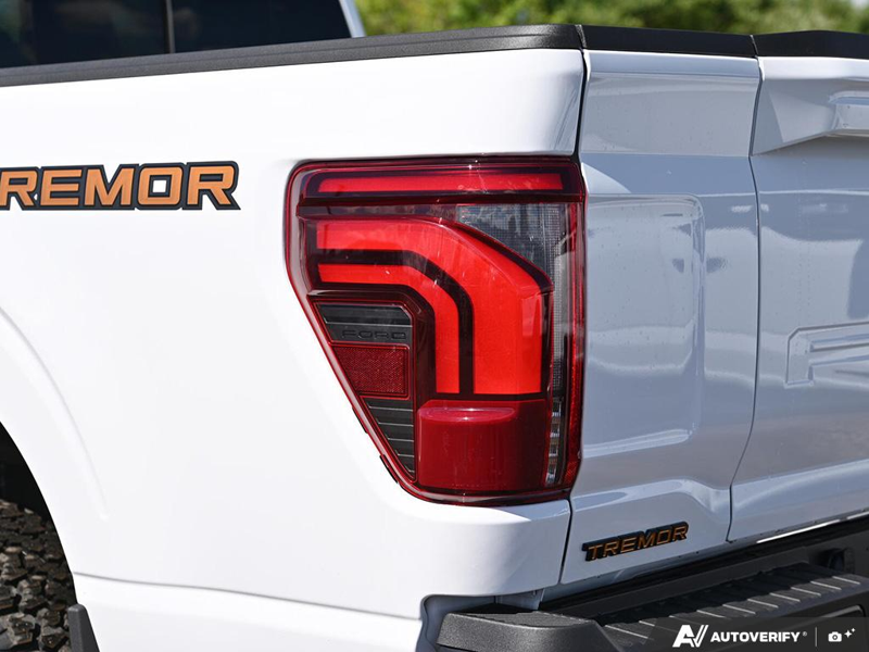 NEW 2026 Ford F-150 Tremor - Oxford White Exterior / BLACK TREMOR LEATHER Interior - $90,273 - Stock #E60746 - VIN 1FTFW4L51TFB13013 - Photo 11