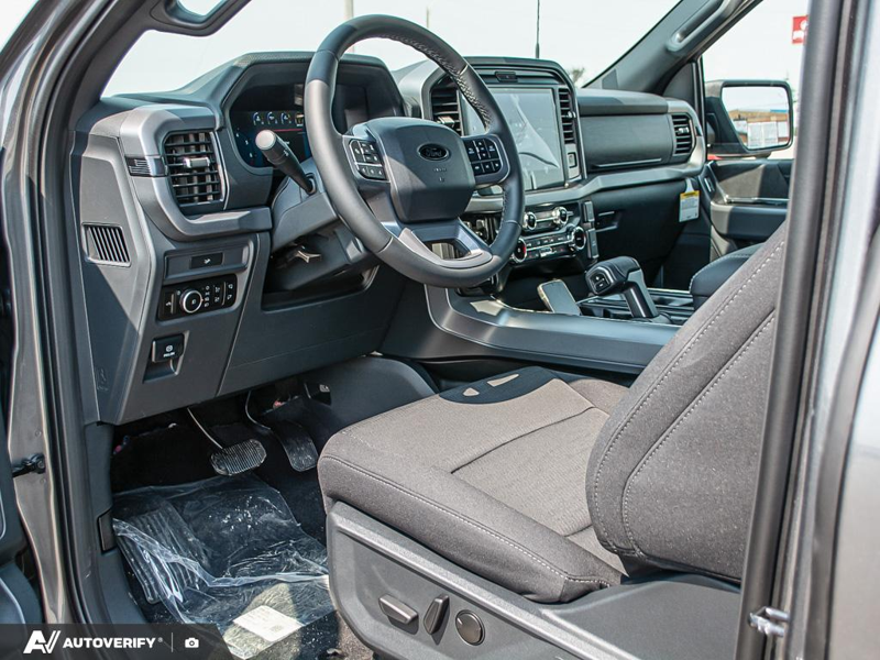 NEW 2026 Ford F-150 XLT - Carbonized Grey Metallic Exterior / BLACK SPORT CLOTH Interior - $72,517 - Stock #D60713 - VIN 1FTFW3L86TFB68755 - Photo 13