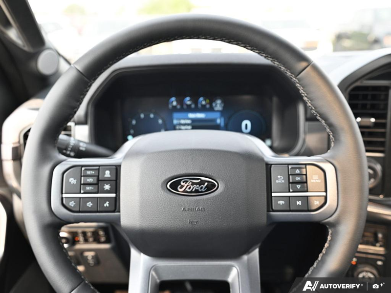 NEW 2026 Ford F-150 LARIAT - Star White Tri-coat Metallic Exterior / BLACK ACTIVE X Interior - $83,411 - Stock #E60856 - VIN 1FTFW5L86TFB49750 - Photo 14