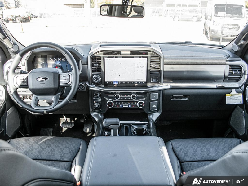 NEW 2026 Ford F-150 LARIAT - Antimatter Blue Metallic Exterior / BLACK, ACTIVEX TRIMMED 40/CONSOLE/40 FRONT SEATS (B) Interior - $78,859 - Stock #E61062 - VIN 1FTFW5L50TFB76593 - Photo 26