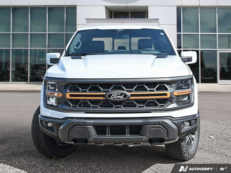 NEW 2026 Ford F-150 Tremor - Oxford White Exterior / BLACK TREMOR LEATHER Interior - $85,944 - Stock #E60980 - VIN 1FTFW4L84TFB68078 - Photo 2