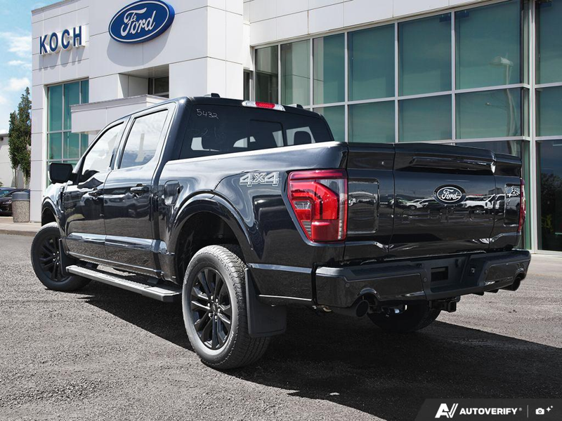 NEW 2026 Ford F-150 LARIAT - Antimatter Blue Metallic Exterior / BLACK ACTIVE X Interior - $86,482 - Stock #E60772 - VIN 1FTFW5L89TFB15432 - Photo 4