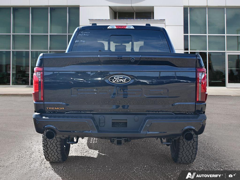 NEW 2026 Ford F-150 Tremor - Antimatter Blue Metallic Exterior / BLACK, UNIQUE SPORT CLOTH 40/CONSOLE/40 POWER FRONT SEAT Interior - $76,929 - Stock #E61089 - VIN 1FTFW4L5XTFC08671 - Photo 5
