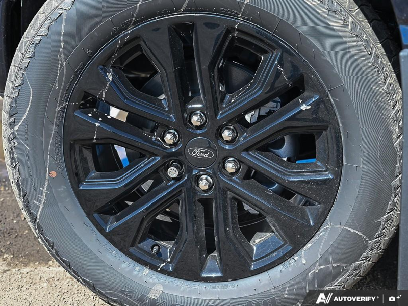 NEW 2026 Ford F-150 LARIAT - Antimatter Blue Metallic Exterior / BLACK ACTIVE X Interior - $80,784 - Stock #E60833 - VIN 1FTFW5L82TFB48398 - Photo 6