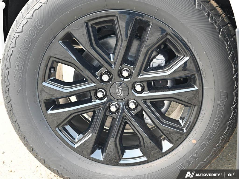 NEW 2026 Ford F-150 LARIAT - Star White Tri-coat Metallic Exterior / BLACK ACTIVE X Interior - $83,411 - Stock #E60856 - VIN 1FTFW5L86TFB49750 - Photo 6