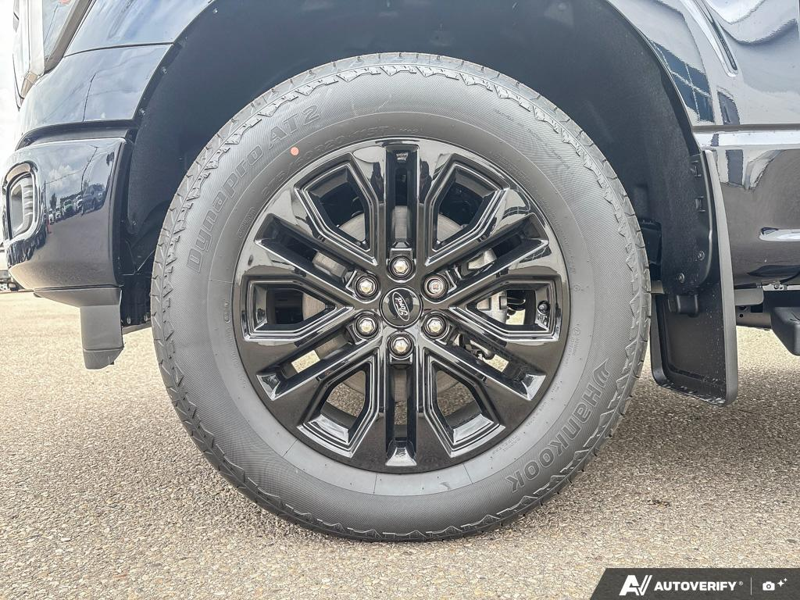 NEW 2026 Ford F-150 LARIAT - Antimatter Blue Metallic Exterior / BLACK ACTIVE X Interior - $86,262 - Stock #E60900 - VIN 1FTFW5L84TFB69768 - Photo 6