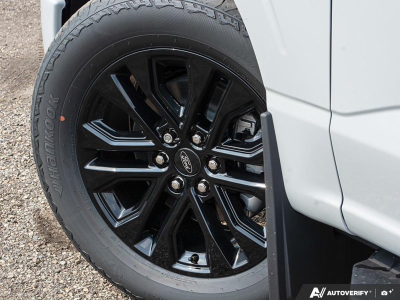 NEW 2026 Ford F-150 LARIAT - Avalanche Exterior / BLACK ACTIVE X Interior - $74,934 - Stock #E60889 - VIN 1FTFW5L81TKE55231 - Photo 6