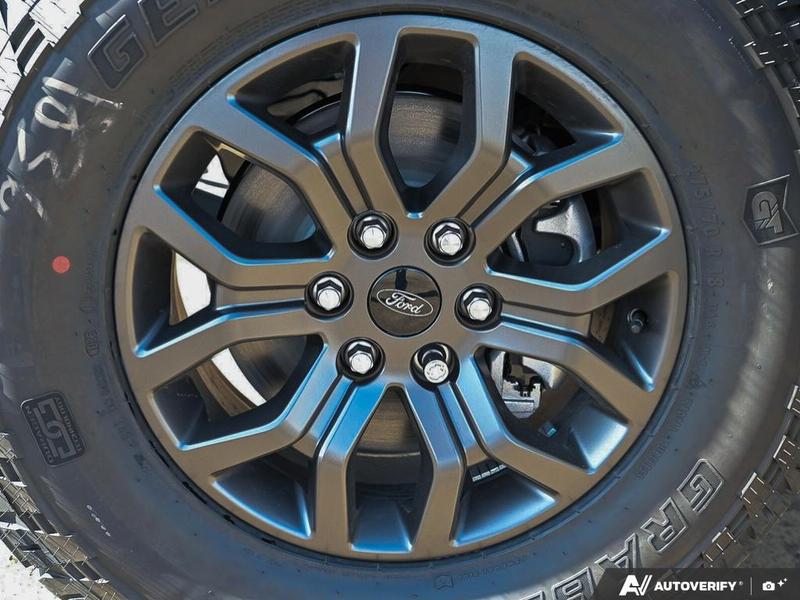 NEW 2026 Ford F-150 Tremor - Oxford White Exterior / BLACK SPORT CLOTH Interior - $81,414 - Stock #E60582 - VIN 1FTFW4L58TFA80804 - Photo 9