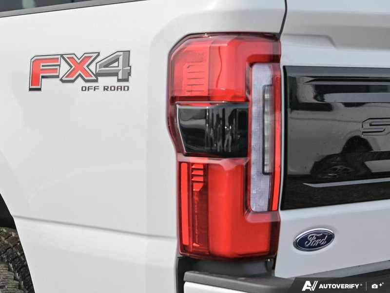 NEW 2026 Ford F-350 Super Duty Platinum - Star White Tri-coat Metallic Exterior / BLACK ONYX/BLUE LEATHER Interior - $116,043 - Stock #E60392 - VIN 1FT8W3BT6TED89079 - Photo 12