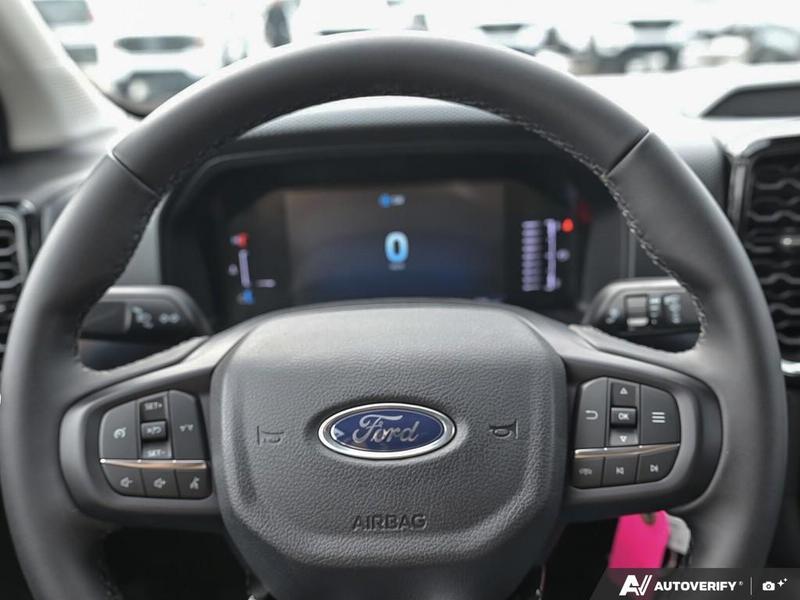 NEW 2026 Ford Ranger XLT - Oxford White Exterior / EBONY PREMIUM CLOTH Interior - $51,819 - Stock #E60294 - VIN 1FTER4HH6TLE04274 - Photo 14