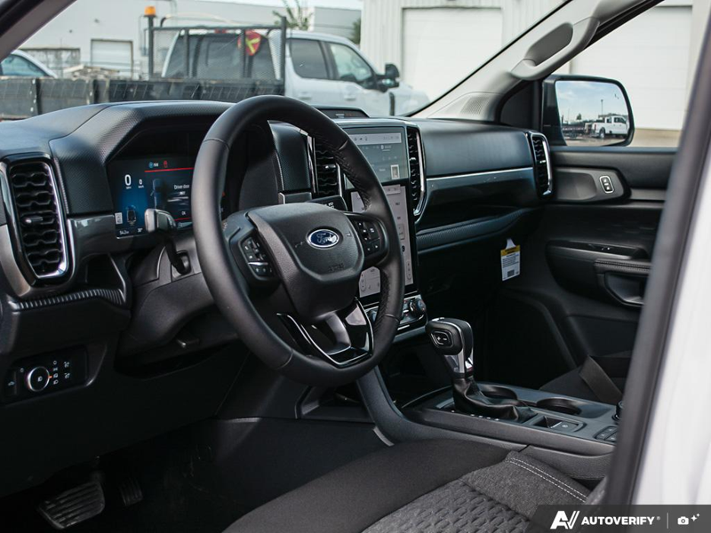 NEW 2026 Ford Ranger XLT - Oxford White Exterior / EBONY PREMIUM CLOTH Interior - $56,306 - Stock #E60636 - VIN 1FTER4HP3TLE16714 - Photo 13