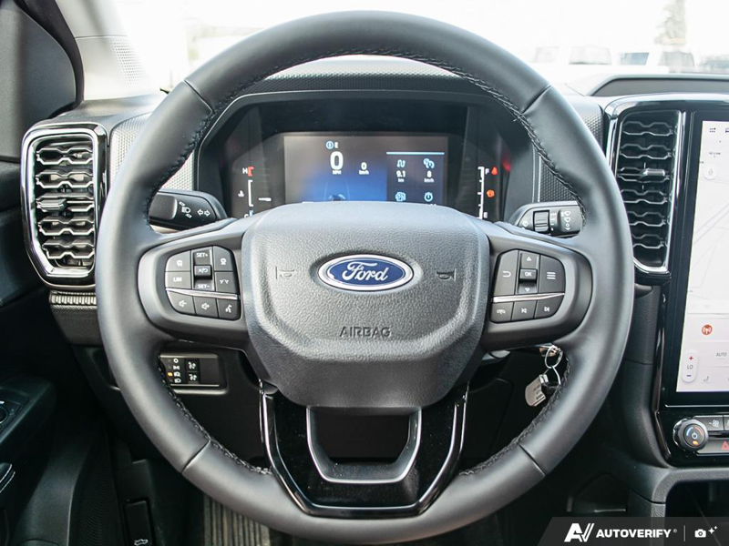 NEW 2026 Ford Ranger XLT - Oxford White Exterior / EBONY PREMIUM CLOTH Interior - $56,306 - Stock #E60636 - VIN 1FTER4HP3TLE16714 - Photo 14