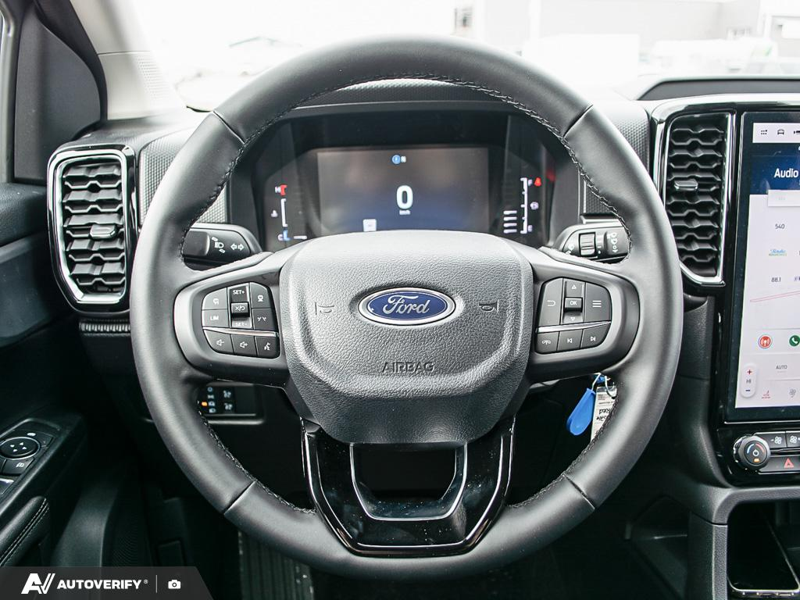 NEW 2026 Ford Ranger XLT - Ruby Red Tri-coat Metallic Exterior / EBONY PREMIUM CLOTH Interior - $53,741 - Stock #D60201 - VIN 1FTER4HH2TLE03526 - Photo 14