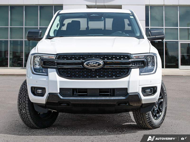 NEW 2026 Ford Ranger XLT - Oxford White Exterior / EBONY PREMIUM CLOTH Interior - $57,869 - Stock #E60297 - VIN 1FTER4HP7TLE04386 - Photo 2