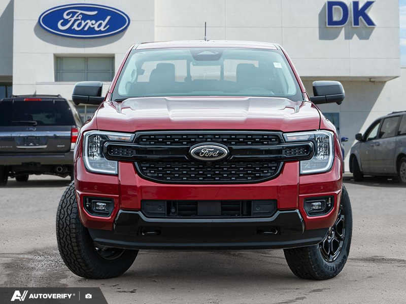 NEW 2026 Ford Ranger XLT - Ruby Red Tri-coat Metallic Exterior / EBONY PREMIUM CLOTH Interior - $53,741 - Stock #D60201 - VIN 1FTER4HH2TLE03526 - Photo 2