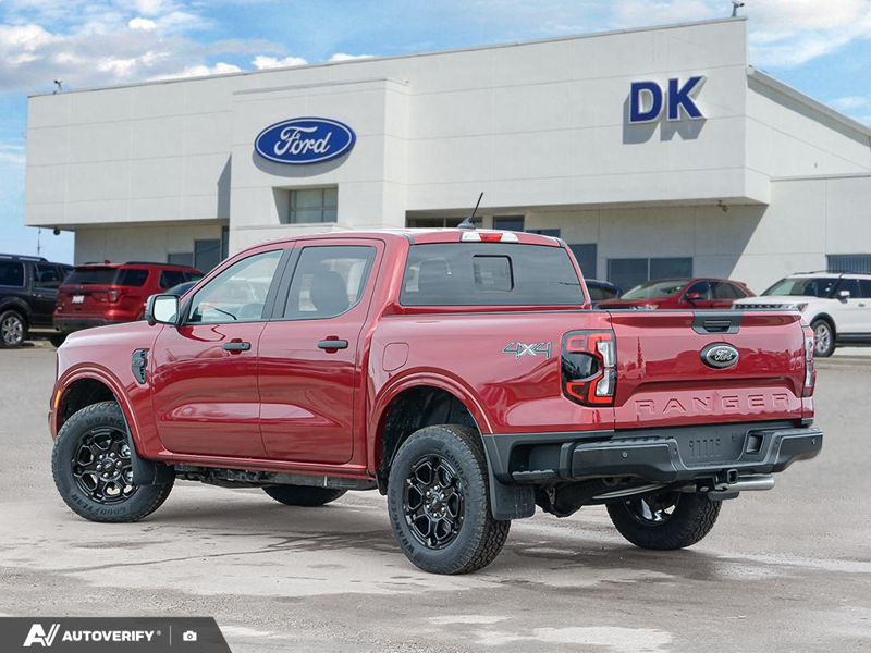 NEW 2026 Ford Ranger XLT - Ruby Red Tri-coat Metallic Exterior / EBONY PREMIUM CLOTH Interior - $53,741 - Stock #D60201 - VIN 1FTER4HH2TLE03526 - Photo 4