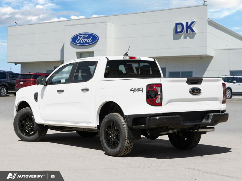NEW 2026 Ford Ranger XLT - Oxford White Exterior / EBONY PREMIUM CLOTH Interior - $54,184 - Stock #D60481 - VIN 1FTER4HH1TLE16638 - Photo 4