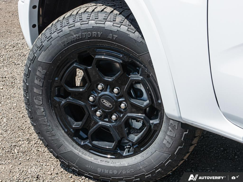 NEW 2026 Ford Ranger XLT - Oxford White Exterior / EBONY PREMIUM CLOTH Interior - $57,869 - Stock #E60297 - VIN 1FTER4HP7TLE04386 - Photo 6