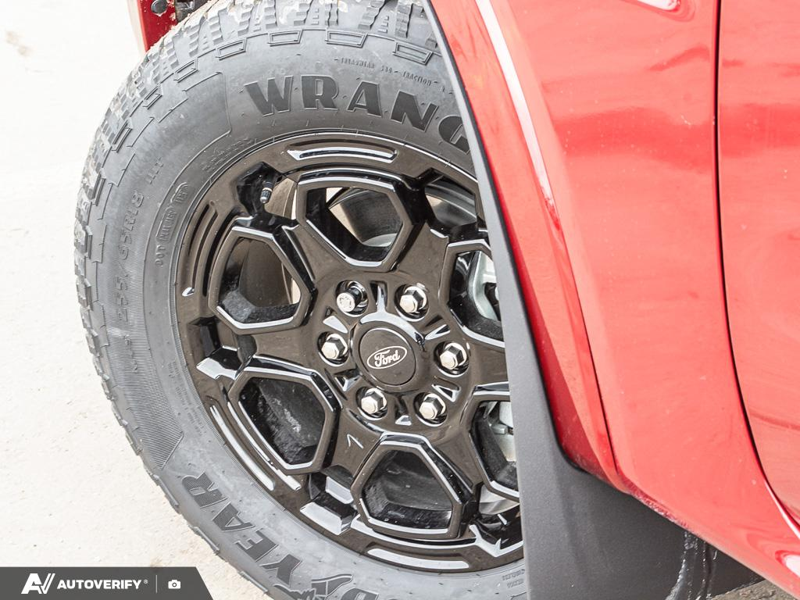 NEW 2026 Ford Ranger XLT - Ruby Red Tri-coat Metallic Exterior / EBONY PREMIUM CLOTH Interior - $53,741 - Stock #D60201 - VIN 1FTER4HH2TLE03526 - Photo 6