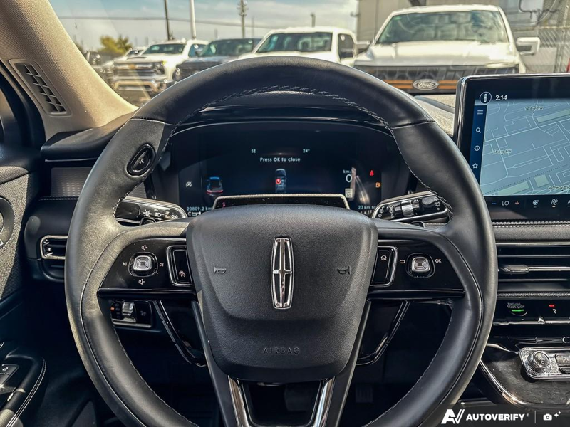 USED 2026 Lincoln Corsair Reserve - Asher Grey Metallic Clearcoat Exterior / EBONY, PREMIUM LEATHER-TRIMMED HEATED/VENTILATED CAPTAIN'S CHAIR Interior - $57,077 - Stock #EP4718 - VIN 5LMCJ2DA1TUL00077 - Photo 14