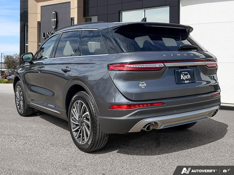 USED 2026 Lincoln Corsair Reserve - Asher Grey Metallic Clearcoat Exterior / EBONY, PREMIUM LEATHER-TRIMMED HEATED/VENTILATED CAPTAIN'S CHAIR Interior - $57,077 - Stock #EP4718 - VIN 5LMCJ2DA1TUL00077 - Photo 4