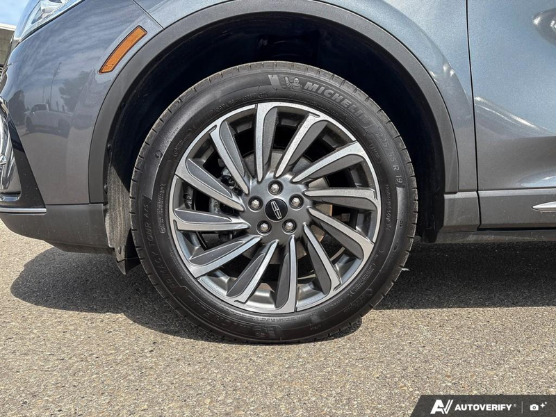 USED 2026 Lincoln Corsair Reserve - Asher Grey Metallic Clearcoat Exterior / EBONY, PREMIUM LEATHER-TRIMMED HEATED/VENTILATED CAPTAIN'S CHAIR Interior - $57,077 - Stock #EP4718 - VIN 5LMCJ2DA1TUL00077 - Photo 6